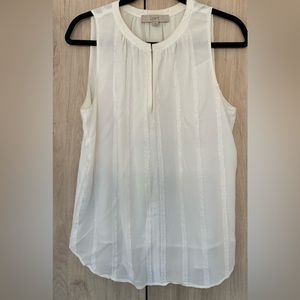 Lovely sleeveless white blouse